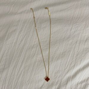Elegant Gold and Red Clover Necklace